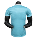 Camisa Arsenal 25/26 Pré-Jogo - Azul Celeste - Versão Jogador